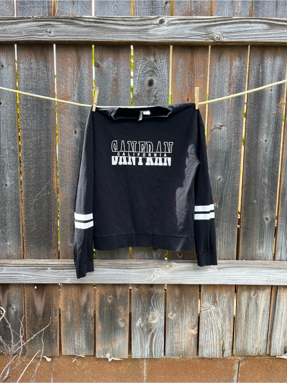 H&M Black Crewneck Sweater with White Stripe Detail